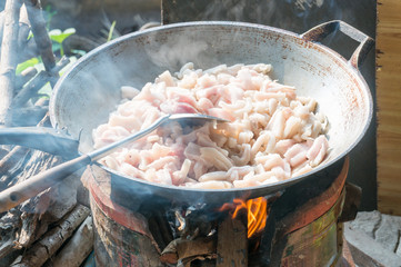 Pork skin in pan for making lard on stove, Selective focus on ce