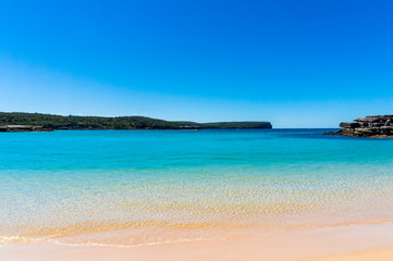 Fototapeta na wymiar Pristine beach with clear water