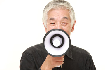 senior Japanese man with megaphone
