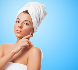 portrait of a beautiful young woman preparing to take a bath