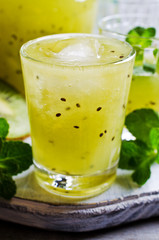 Fototapeta premium Cocktail with kiwi and mint
