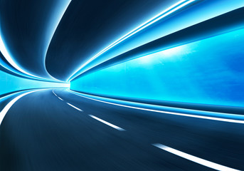 Abstract blurred speed motion road in glass tunnel underwater,cold mood