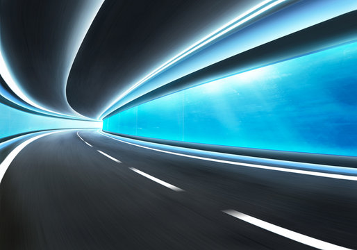 Fototapeta Abstract blurred speed motion road in glass tunnel underwater