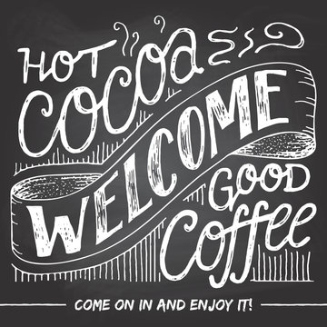 Fototapeta Welcome to the cafe for a hot cocoa and good coffee. A welcome sign for cafes or shop visitors on blackboard background with chalk. Hand lettering