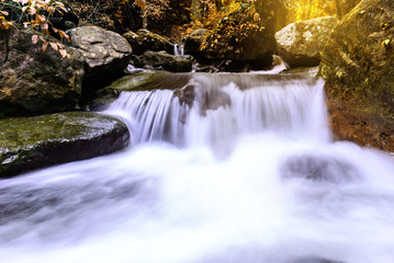 Fototapeta na wymiar Rainforest waterfall in national park, Saraburi Thailand.
