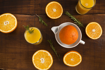 Fototapeta na wymiar Orange juices and oranges.