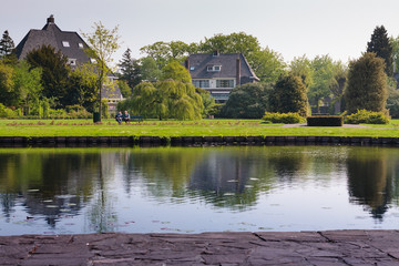 Fototapeta premium Couple Sitting In The Park