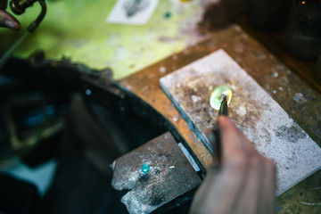 Goldsmith working on a ring