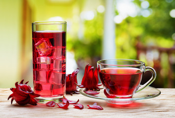 Cup of hot hibiscus tea (rosella) and the same cold drink