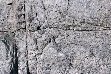 Cracks and dissolves in the cooled lava