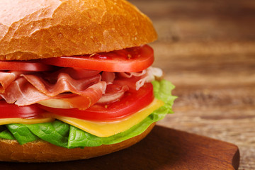Prosciutto ham sandwich with vegetables.