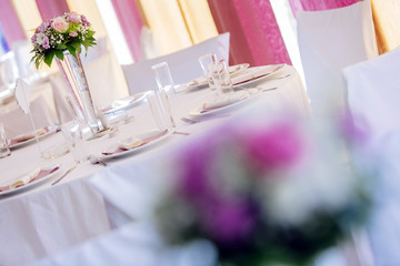 Beutiful wedding setting with bouquet
