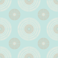 Fototapeta premium Large and Small Brown and Ivory Circles of Multiple Lines on Pas