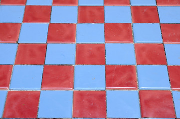 Red and blue chessboard for background.