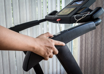 Fitness exercising on moonwalker treadmill gym equipment
