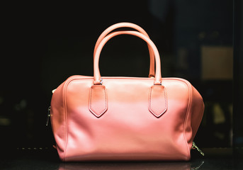 Woman handbag in a showcase of a luxury store
