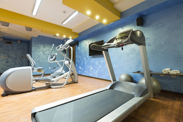 Hotel gym interior with equipment