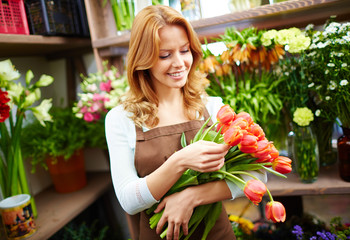 Florist with bunch of fresh tulips