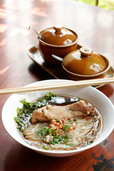 Rice noodle soup with stewed chicken and chinese herbs