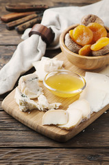 Mix of different cheese with honey