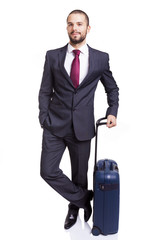 Business man standing with suitcase on white background