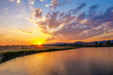 Beautiful sunset behind the hill