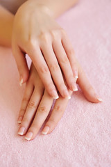 Naklejka premium Woman hands with beautiful french manicure