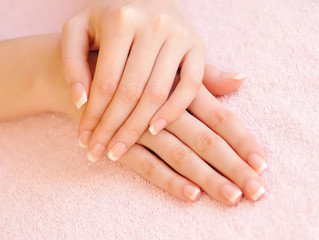 Woman hands with beautiful french manicure