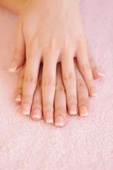 Naklejka premium Woman hands with beautiful french manicure