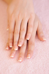Woman hands with beautiful french manicure