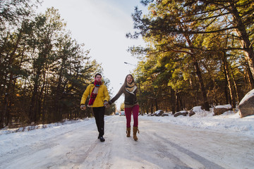 Couple scates in the forest