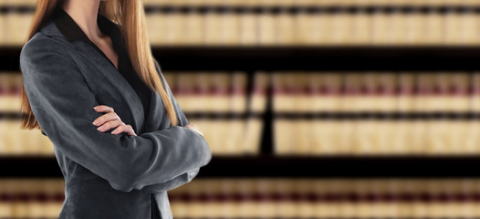 Businesswoman in front of a bookcase