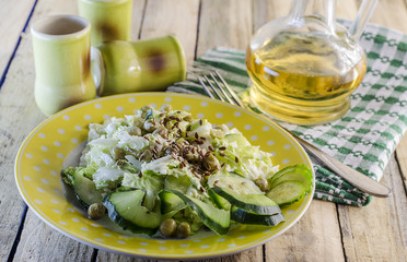 Obraz na płótnie Canvas salad with green vegetables and flax seed