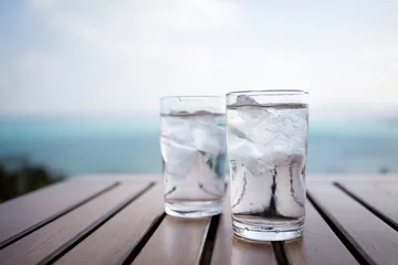 Fototapeten Glass of water at restaurant © leungchopan