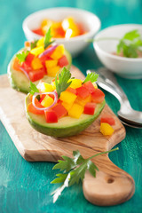 avocados stuffed with tomato pepper salad