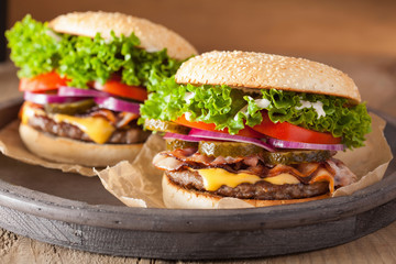 bacon cheese burger with pickles tomato onion