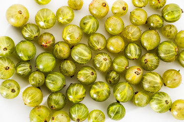 Gooseberries fruits on white background. Ripe summer fruits background