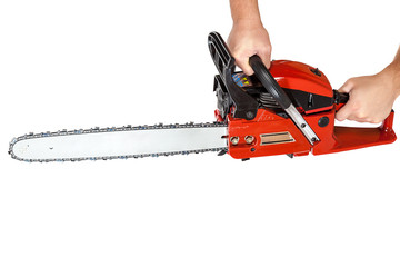 Gasoline chain saw in hand.