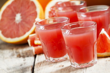 Red cocktail with vodka and bloody orange juice selective focus