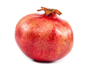 Fresh pomegranate on white background.