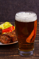 Glass of Beer, Pork Ribs and Vegetables