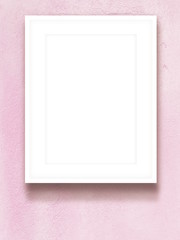 Close-up of white photo frame on pink canvas background