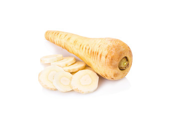 Fresh parsnip roots on a white background