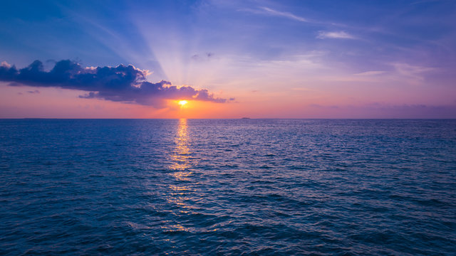 Fototapeta Spectacular sunset over ocean.