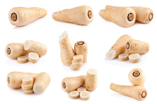 Fresh parsnip roots on a white background