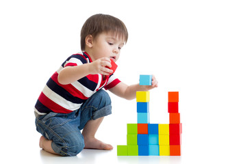 kid little boy playing on floor