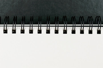 Close-up of ring bound artists sketchbook.