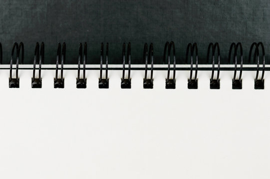 Close-up of ring bound artists sketchbook.