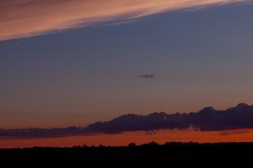 Bright summer sunset.Hot evening
