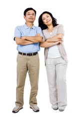 Fototapeta premium Smiling couple with arms folded